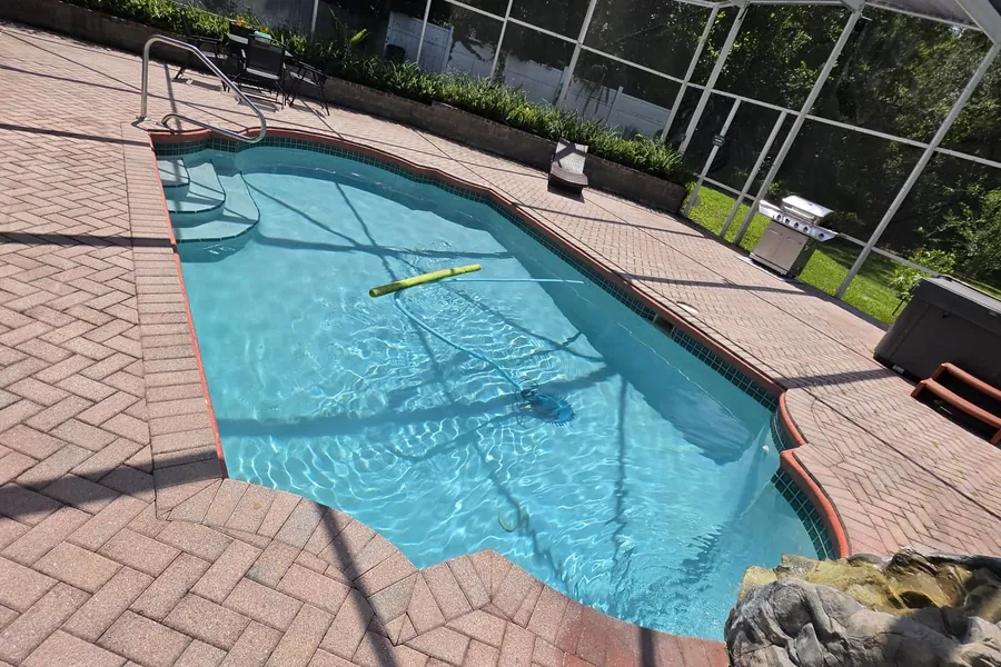 Customer pool after Aqua Rescue service: clear blue water